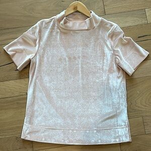 Anthropologie shiny, soft light pink short sleeve shirt in size small.